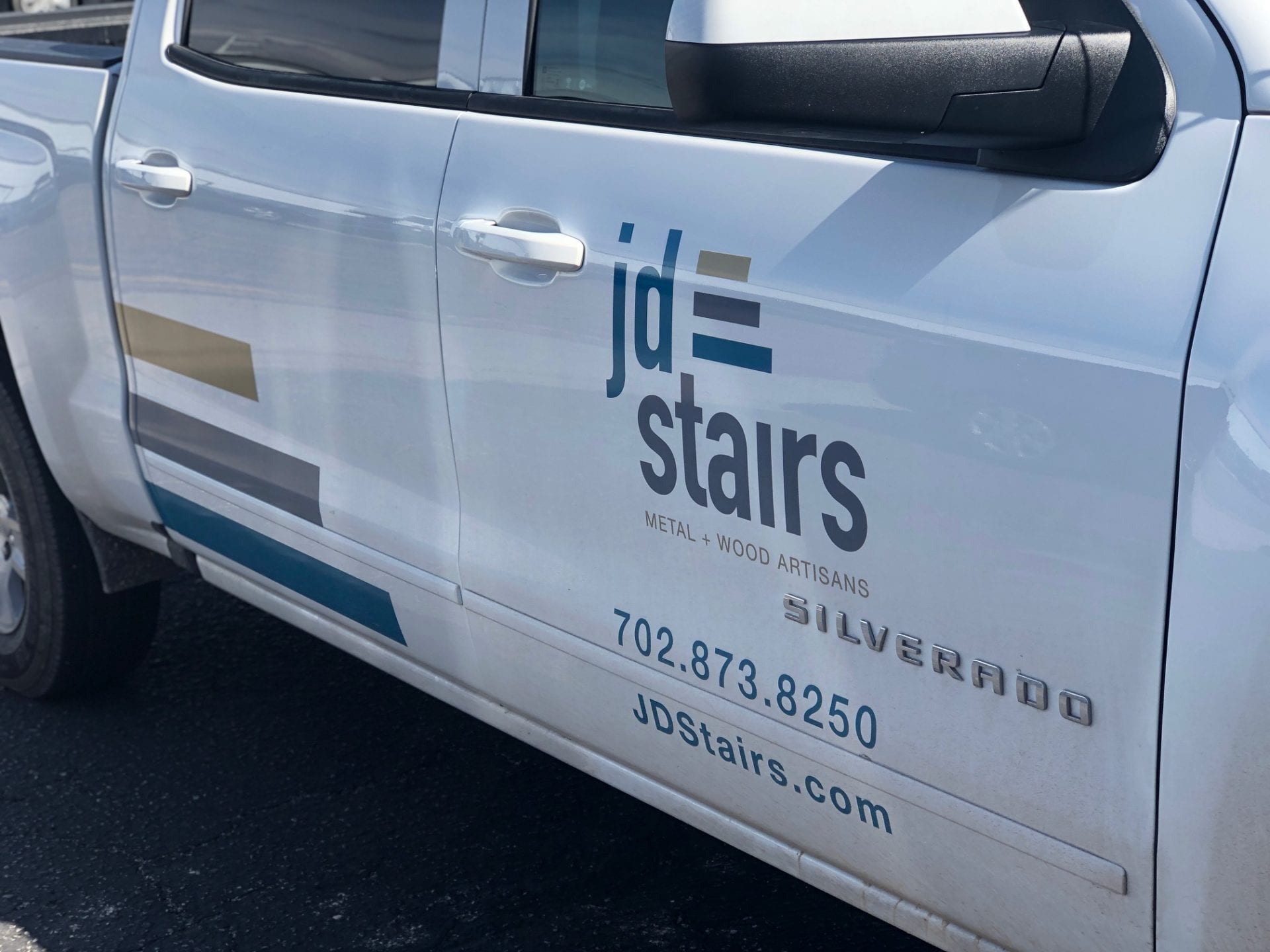 JD Stairs logo on the side of a work truck