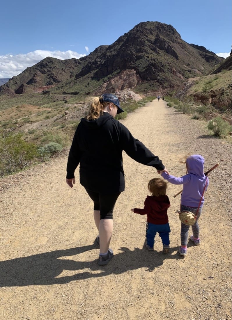 Joslynn maintaining a healthy work-life balance during COVID-19 by taking her kids on a hike.