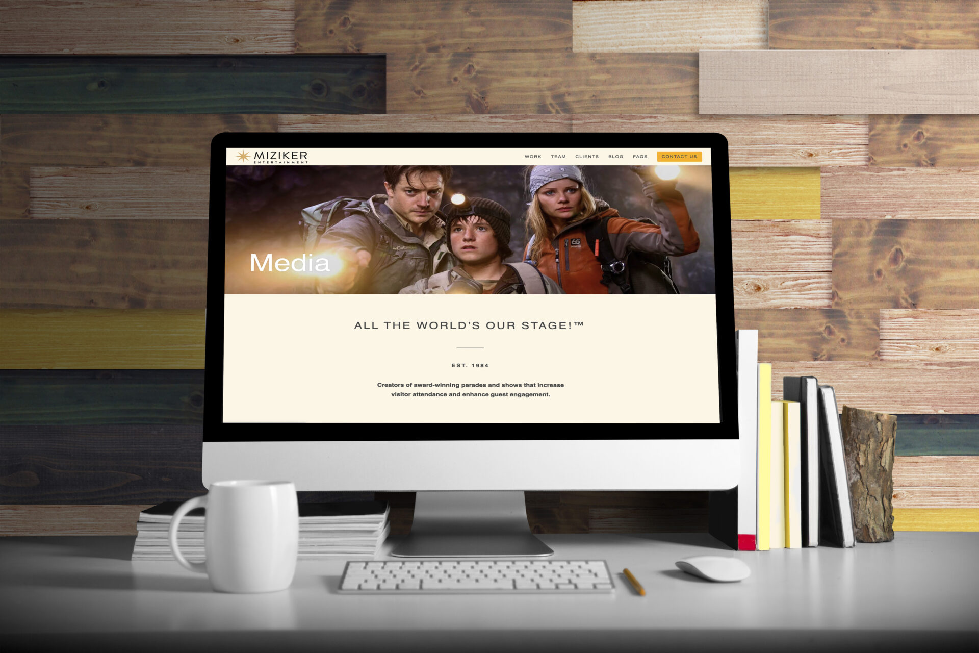 A desktop with the Miziker Entertainment website designed by Canyon Creative